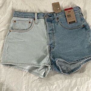 Levi’s 501 light wash shorts. Size 30 button fly NWT.